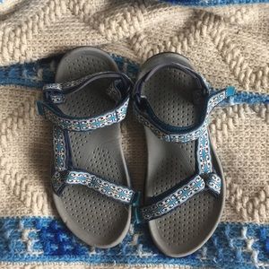 blue and white tevas